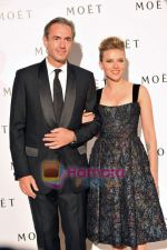 Scarlett Johansson and Moet CEO and President at Moet Chandon event.JPG